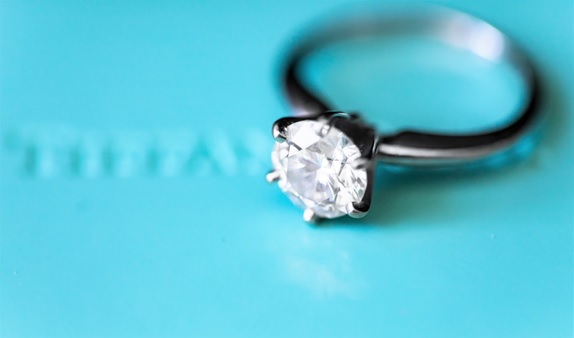 A simple yet well-made diamond ring with a large stone in the center. 